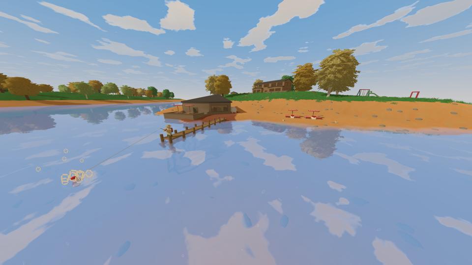 A player on a dock begins reeling in a fish they've caught.